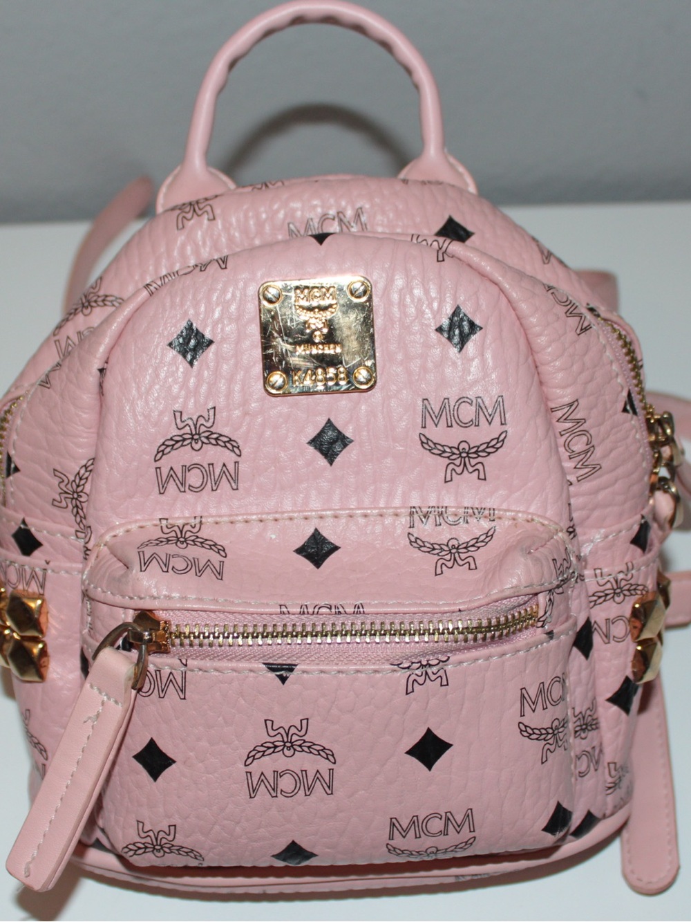 MCM Pink Logo Print Mini Backpack with Gold Hardware